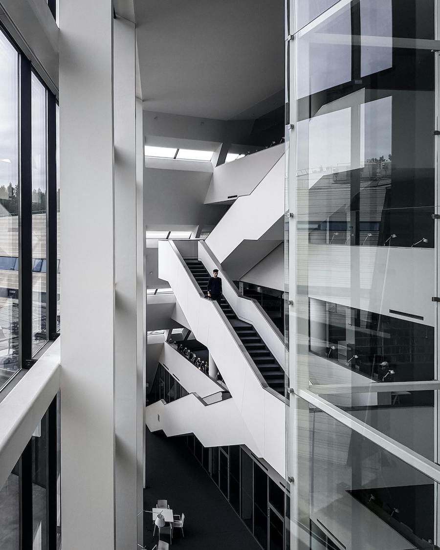 A staircase in a private office, photographed in black and white.